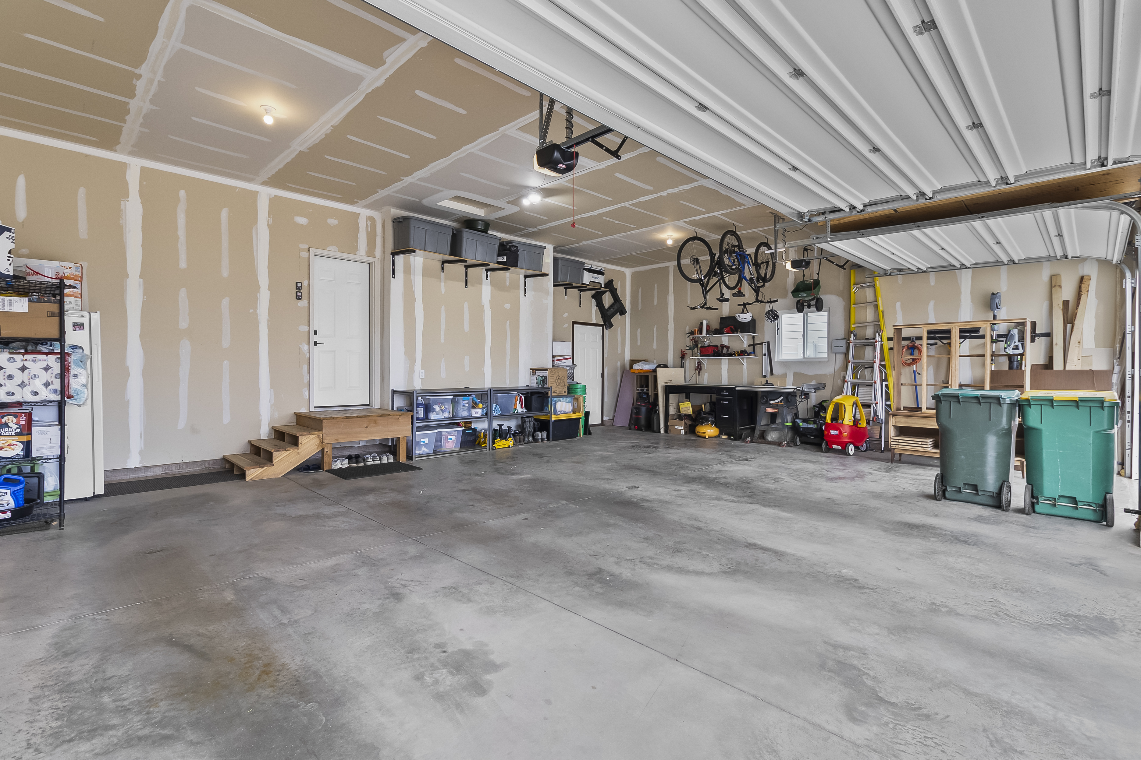 Spacious 3-stall attached garage