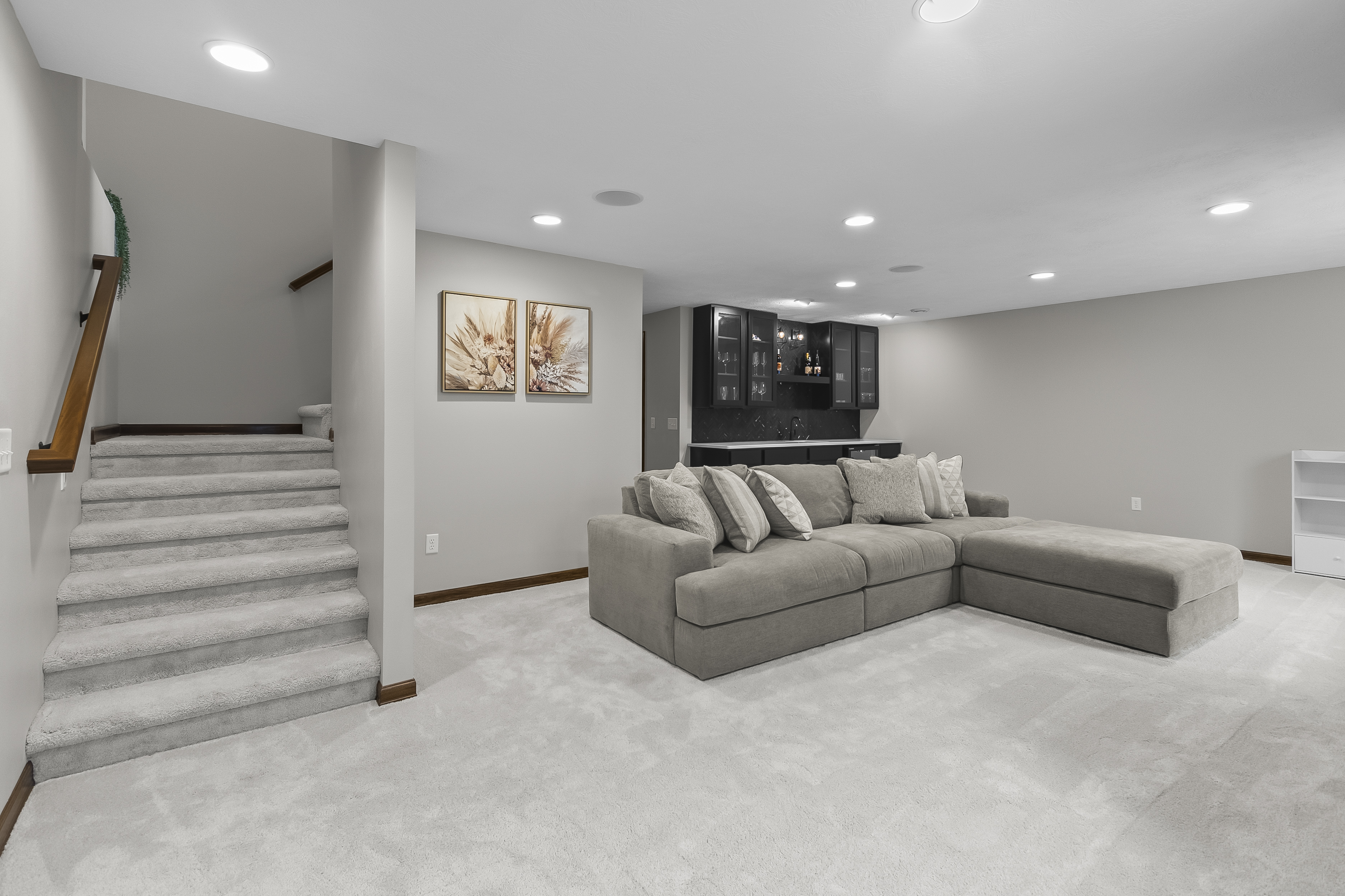 Basement family room with fireplace and wet bar