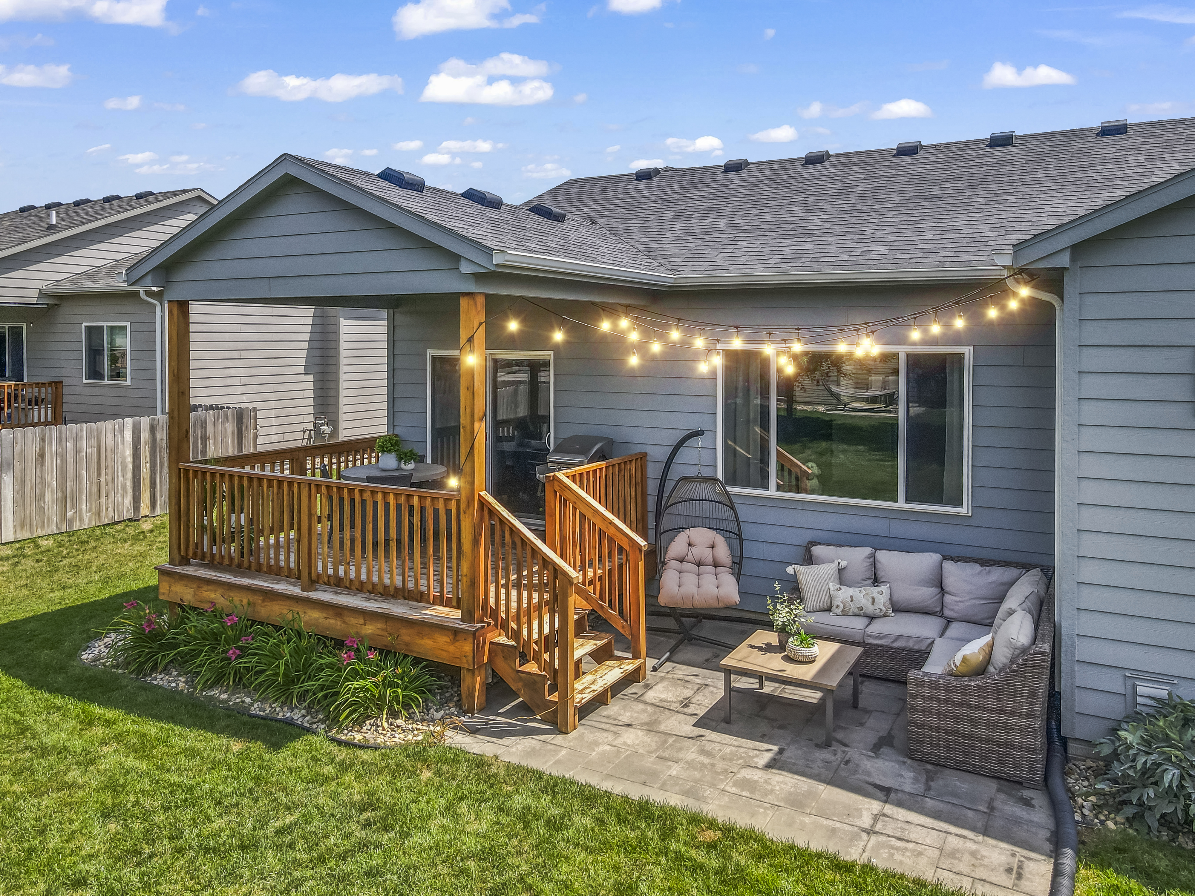 Backyard with cedar deck and paver patio